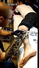 Tattoo Artist's Bionic Arm